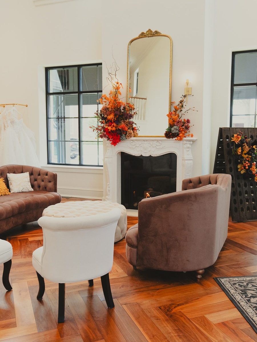 Bright boutique interior with fireplace and lounge seating, photographed by Jubilee